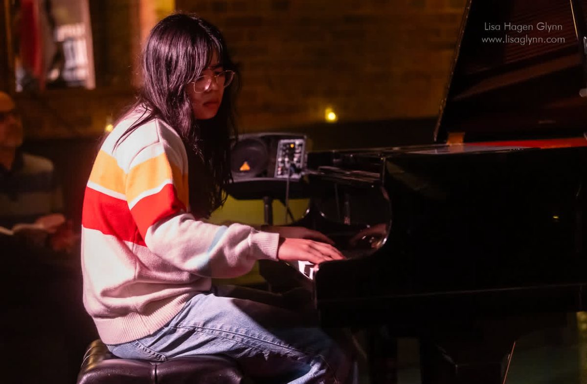 Maddie skillfully plays the piano. 